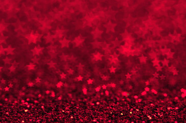 Blue holiday glitter background with stars bokeh.