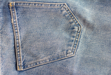 Blue denim, texture, pocket on the back of jeans.