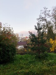 Naklejka premium Beautiful autumn landscape house in the village 
