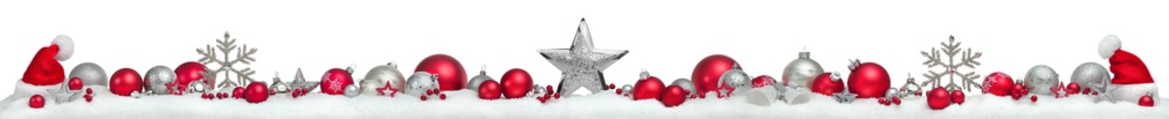 Christmas border or banner with stars and baubles arranged in a row on snow, extra wide and...