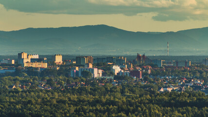 Panorama of the city of Tychy in Silesia. View of the mountains over the city buildings.