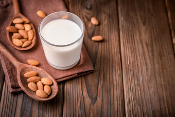 Obraz na płótnie Canvas Almond milk and almond nuts