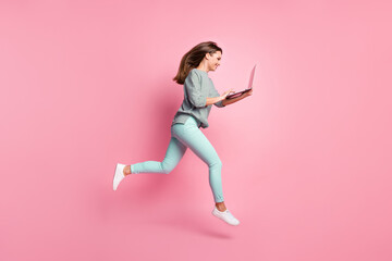 Full size profile photo of optimistic cute brunette hair lady run jump typing laptop wear shirt...