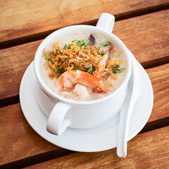 Thai rice soup with shrimps on the Thai breakfast table