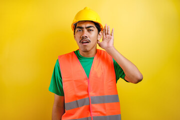 Asian constructor man hearing to rumor or gossip