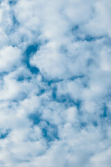 Cloudy sky blue background. Beautiful white fluffy cloud in sunny weather, clear pattern. Outdoors cloudscape environment nature backdrop. God heaven at daylight
