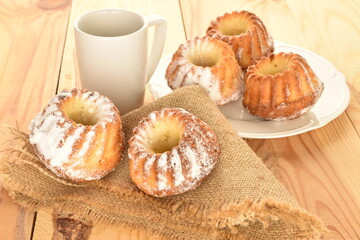 Fragrant sweet cupcakes, close-up, on a  background.