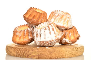 Fragrant sweet cupcakes, close-up, on a white background.