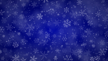 Christmas background of snowflakes of different shapes, sizes and transparency in blue colors