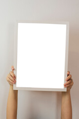 manos con cuadros para fotografía con fondo blanco 