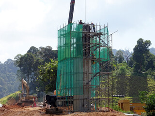 SHAH ALAM, MALAYSIA -AUGUST 6, 2020: Temporary staircase and scaffolding are used in the...