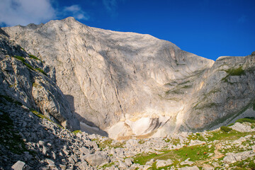 Hiking to Koncheto, view across the peaks of the Pirin Mountains in Bulgaria with Vihren, Kutelo,Todorka,Banski Suhodol , National Park Pirin with company of wild goats