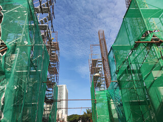 SHAH ALAM, MALAYSIA -AUGUST 6, 2020: Temporary staircase and scaffolding are used in the...