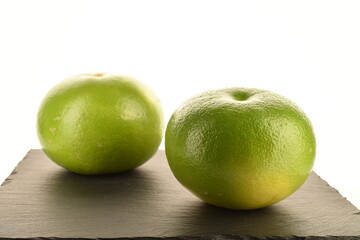 Ripe juicy sweets, close-up, on a white background.