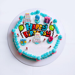 Birthday cake with candles isolated on white