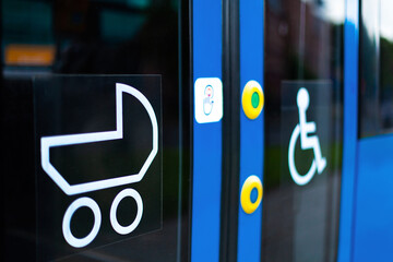 Modern electric transport. Tram with low polo and markings for disabled people and parents with...