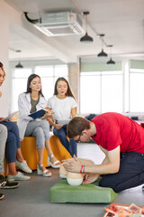 professional safety instructor show exercises, manipulations of first aid help, teach group of...
