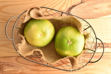 Ripe juicy sweets, close-up, on a  wooden table.