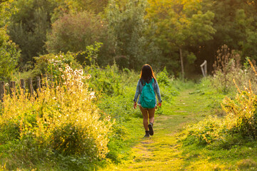 Woman walking in wild nature