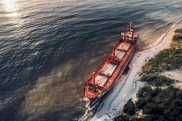 abandoned cargo ship on the black sea coast taken during the day from a quadrocopter