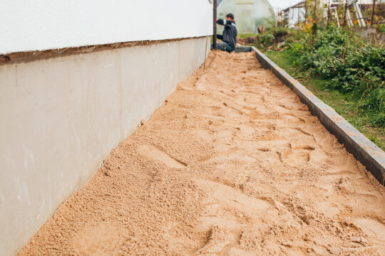 Construction Of A Blind Area Of A House From Paving Slabs - Laying Underground Communications Protection Of The Foundation From Rainwater