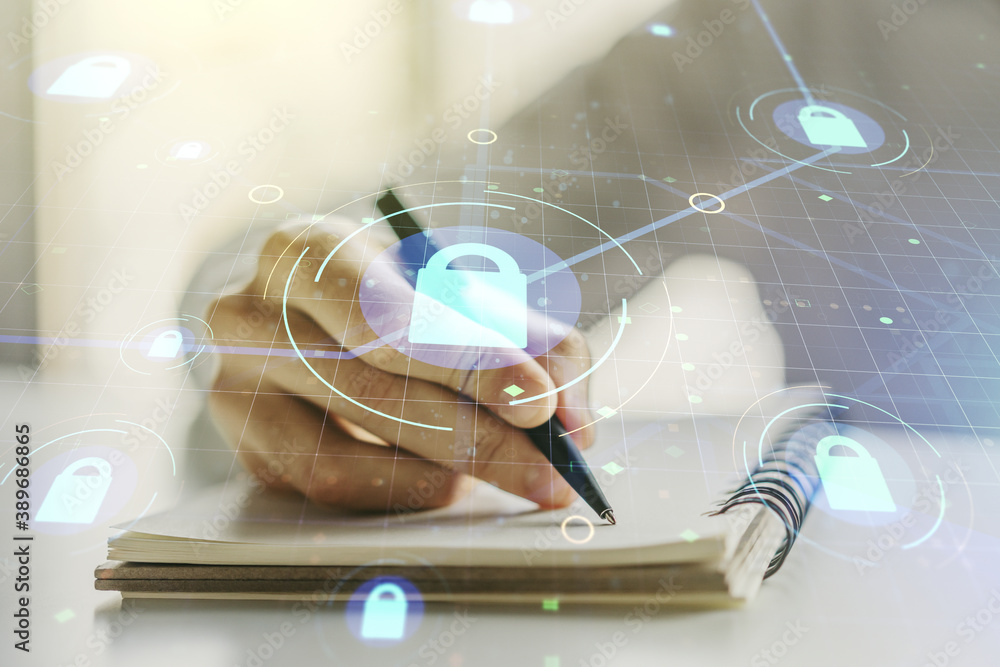 Aufkleber Double exposure of creative lock hologram with chip and man hand writing in notebook on background. Information security concept