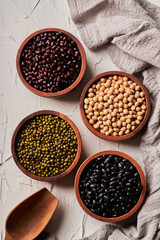 top view different whole grains beans on bowl white background.
