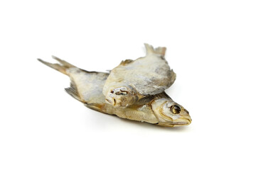 Fototapeta premium Two dry fish isolated on white background.