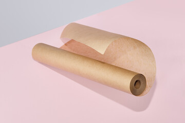 Baking paper on pink and gray background