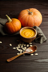 Autumn pumpkin cream soup with pumpkin seeds