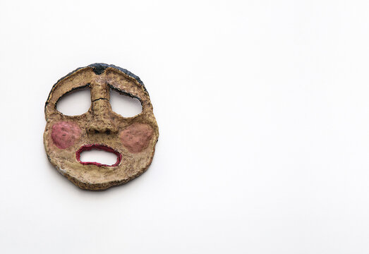 tragic greek theater mask expressing feelings of loss and pain