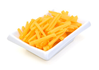Cheddar cheese slices in plate on white background.