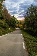 Fototapeta na wymiar View of mountain road. Asphalt roads, during autumn season.