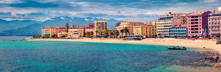 Panoramic summer cityscape of Ajaccio town. Breathtaking morning scene of Corsica island, France, Europe. Amazing Mediterranean seascape. Traveling concept background.