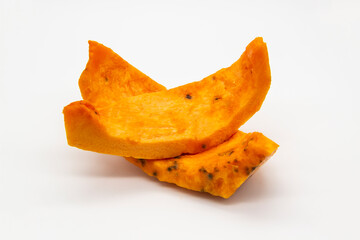 Naklejka premium A Rotten pieces of pumpkin. Rotten vegetable and spoiled food. A product that has been affected by mold isolated on the white background.