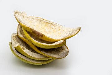 A dry peels from the fruit pomelo isolated in the white background