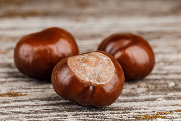 Chestnuts on an old wooden table