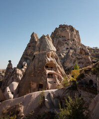 View of the rock fortress Ortahisar and houses in the rocks