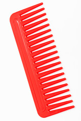 new red comb on white background