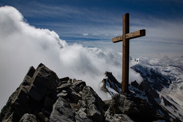 summit cross in the swiss alps