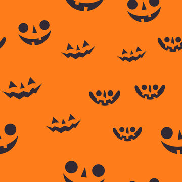 Halloween pumpkin faces seamless pattern. Carved pumpkins texture background.