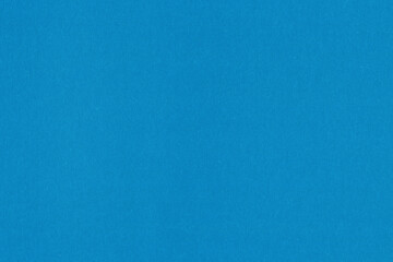 A blue vintage rough sheet of carton. Recycled environmentally friendly cardboard paper texture. Simple minimalist papercraft background.
