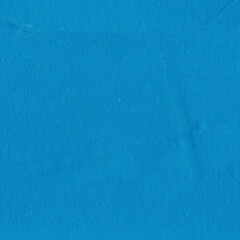 A blue vintage rough sheet of carton. Recycled environmentally friendly cardboard paper texture. Simple minimalist papercraft background.