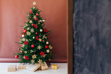 decoration decoration garland Christmas tree with gifts for the new year interior