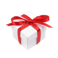 White gift box with red ribbon bow, isolated on white. White box with red ribbon. Gift for Christmas, New Year, Birthday, Valentine's Day. 