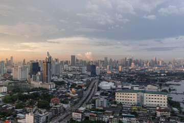 Naklejka na ściany i meble Bangkok, Thailand - Oct 20, 2020 : City view of Bangkok before the sunset creates energetic feeling to get ready for the day waiting ahead. Copy space, Selective focus.