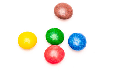 Appetizing colored candies on a white background