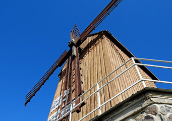 Grain mill Kozlak windmill standing by the Bug River in the village of Brok in Masovia, Poland on a...