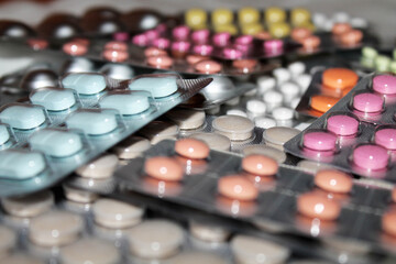 pharmaceuticals antibiotics tablets capsule in a blister defocused