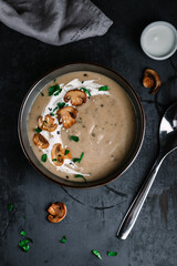 Creamy mushroom soup with garnish flatlay